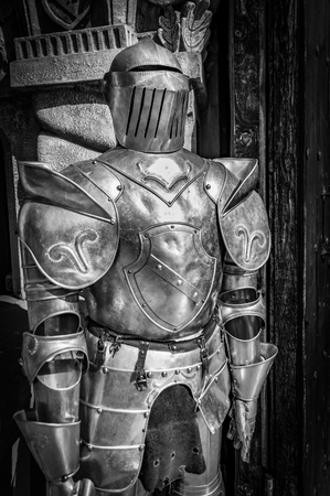 Medieval armor in front of the entrance to a castle.のeditorial素材