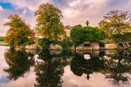 Wakefield, United Kingdom - October 20, 2016: Walton Hall, a 4 star hotel in a scenic setting of rolling parkland with its own lake, a backdrop of ancient woodland and a championship golf course.のeditorial素材