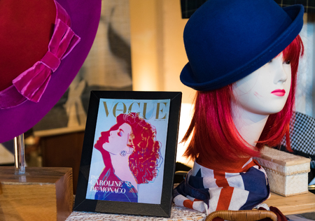 Milan, Italy - November 1, 2015: women's hats in old fashioned are exposed in a vintage market.のeditorial素材