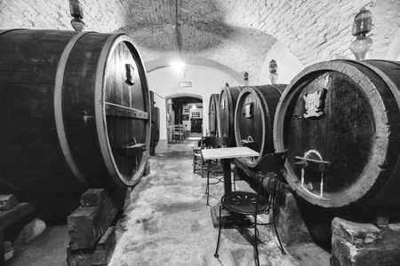 Oak barrels in an old Italian wine cellar.のeditorial素材