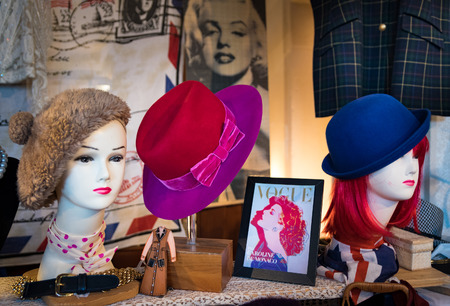 Milan, Italy - November 1, 2015: women's hats in old fashioned are exposed in a vintage market.のeditorial素材