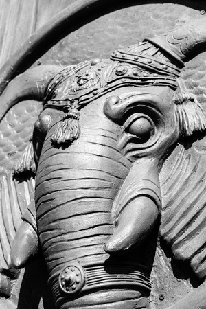 Antique door knocker shaped like elephant's head.の写真素材