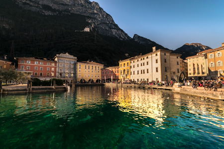 Riva del Garda, Italy - April 15, 2016: The town of Riva del Garda seen from the lake.のeditorial素材