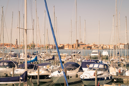 Chioggia, Italy - May 20, 2016: View of the tourist port of Chioggia, with the island union background.のeditorial素材