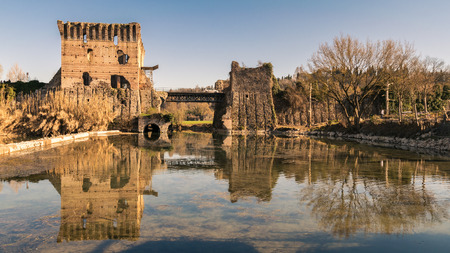 The Visconti Bridge in Valeggio is a bridge-dam built in the fourteenth century and located in the territory of Valeggio sul Mincio. It is commonly called "long-bridge".の写真素材