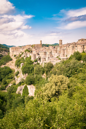 Panorama of Sorano, a town built on a tuff rock, one of the most beautiful villages in Italy.の写真素材