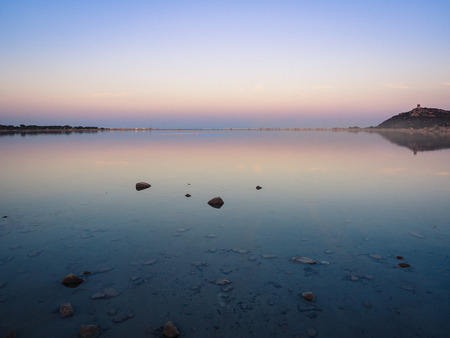 Notteri Pond famous for the presence of pink flamingos at dusk. Sardinia, Italy.の写真素材