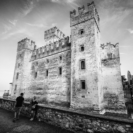 Sirmione, Italy - August 3, 2017: Scaliger Castle (13th century) in Sirmione on Garda lake near...