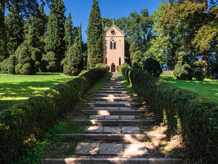 Small church among the trees in the Italian countryside.の写真素材