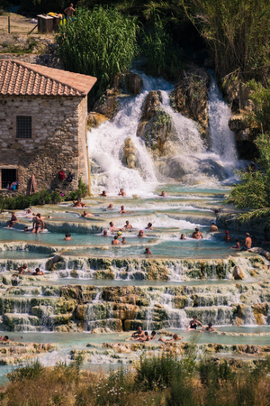 Saturnia, Italy - June 23, 2017: Natural spa with waterfalls in Saturnia, Tuscany, Italy.のeditorial素材