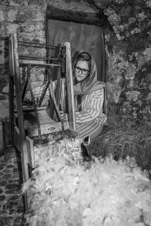 Canale, Italy - December 26, 2015: As every year the medieval town becomes a living Nativity scene. Next to the shepherds and the Holy Family revived ancient crafts and customs of the past.のeditorial素材