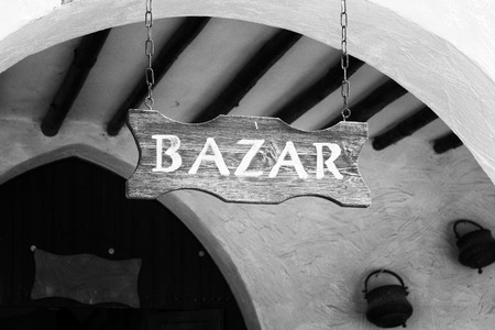 Wood sign at the entrance of an arab market.の写真素材