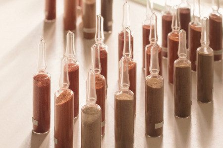 Flasks containing rare earths used for coloring in the textile industry.の写真素材