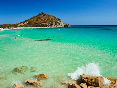 Villasimius, Italy - August 18, 2017: Transparent and turquoise sea in Cala Sinzias, Villasimius. Sardinia, Italyのeditorial素材
