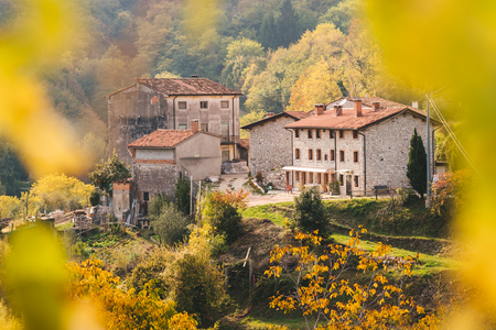 Very small village among the green Italian hills.の写真素材