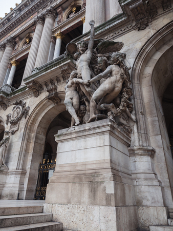 Statues that adorn the facade of the National Academy of Music in Paris.