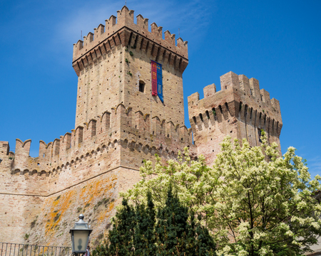 Offagna, Italy - April 29, 2018: View of the main tower of the medieval fortress.
