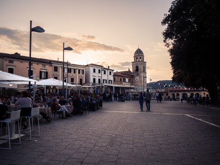 Sirolo, Italy - April 29, 2018: Sunset on the main square of the center of Sirolo, pearl of the Conero riviera, Italy.のeditorial素材