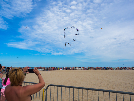 Cervia, Italy - May 1, 2018: Performance of four-wire acrobatic kites revolution by the sea on the occasion of the international kite festival.のeditorial素材