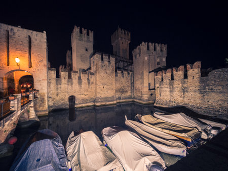 Scaliger Castle in Sirmione on Lake at Night, Garda, Lombardy, Iのeditorial素材