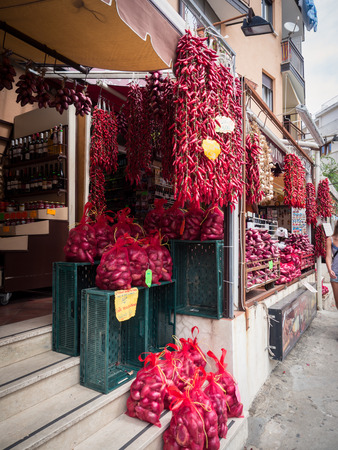 Tropea, Italy - August 21, 2018: Typical shops in Tropea where you can buy spicy Calabrian peppers and the famous Tropea onions.のeditorial素材