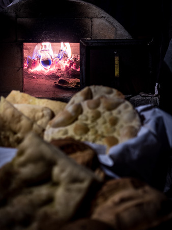 Baked bread in an old wood-burning oven.の写真素材
