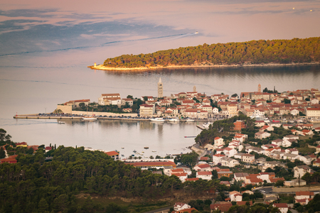 View of the town of Rab, Croatian tourist resort famous for its four bell towers.の写真素材