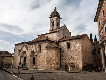 San Quirico d'orcia, Italy - April 23, 2019: Romanesque-Gothic church built in the 13th century in San Quirico d'orcia, Italy.のeditorial素材