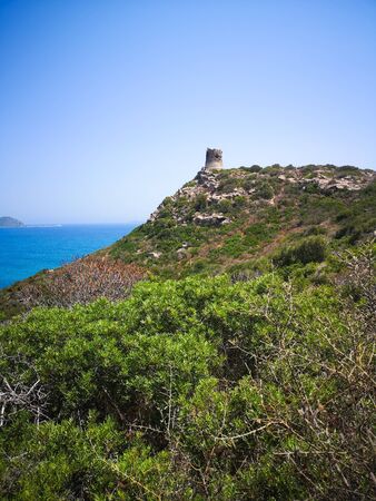 A view of the Spanish watchtower of Porto Giunco, Villasimius, Sardinia, Italy.の写真素材