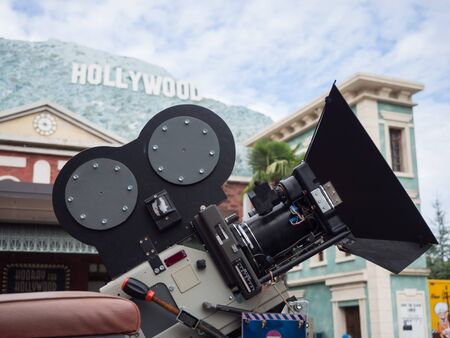 Detail of a vintage camera and in the background the writing on the Hollywood hill.の写真素材