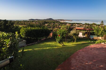 Cape Carbonara panorama at sunset. It is a famous tourist resort near Villasimius, Sardinia, Italy.の写真素材