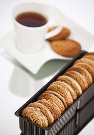 Cookies and tea on the tableの写真素材