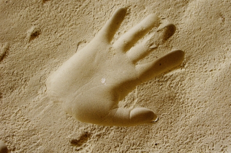 Handprints on hand print in a sand cave around Nevsha Station, Bulgariaの写真素材