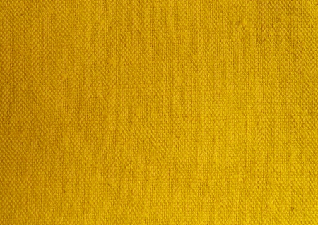 Yellow canvas textile close up の写真素材