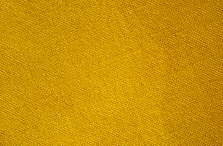 Yellow canvas textile close up の写真素材