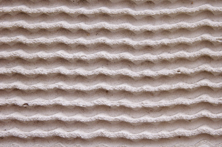 White Plaster in a wave form on wallの写真素材