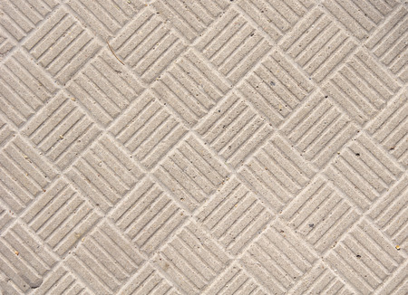 Embossed concrete ornament on street plate