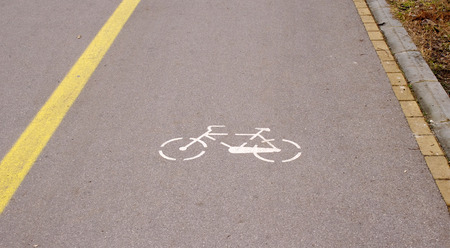 Cycling lane with sign white  bike  closeup