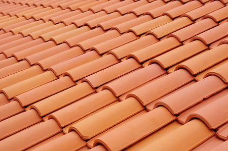 New roof with ceramic tiles closeupの写真素材