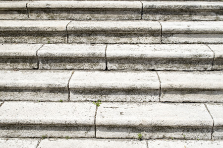 Old  white stone staircase closeup in sunny dayの写真素材