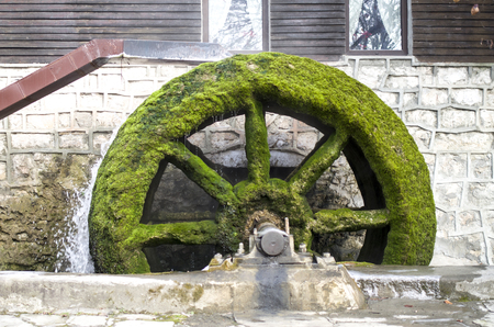 Old working mill wheel of watermill, Bulgaria, Europe