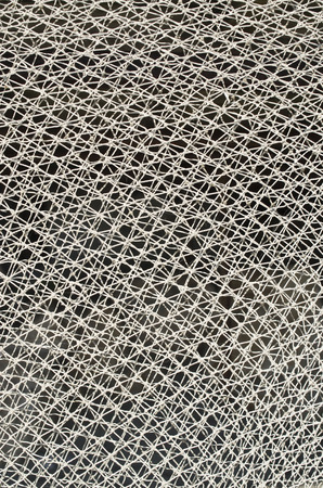 Three fishing nets  on black background in sunny dayの写真素材