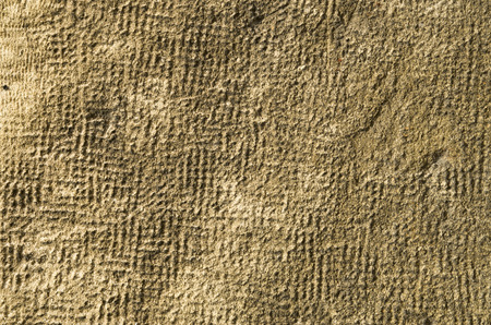 Old stone weathered wall closeup  in sunny day
の写真素材