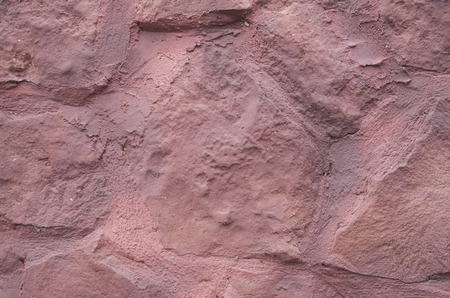 New decorative plaster imitating a stone wall closeup