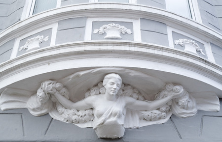 Architecture elements, sculpture of a woman holding a terraceの写真素材
