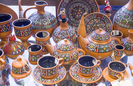 Traditional Georgian crafts ceramic cups, bells and jugs in Tbilisiの写真素材