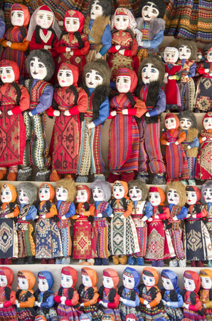 Many colorful armenian dolls in national costumesの写真素材