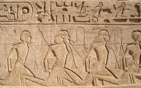 Relief depicting a row of captives in the Abu Simbel temple of Ramesses II, Egypt