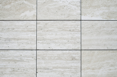 New polished sliced stone cladding on wall closeup