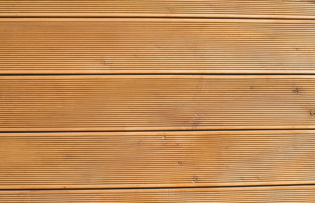 New orange wooden wall closeupの写真素材